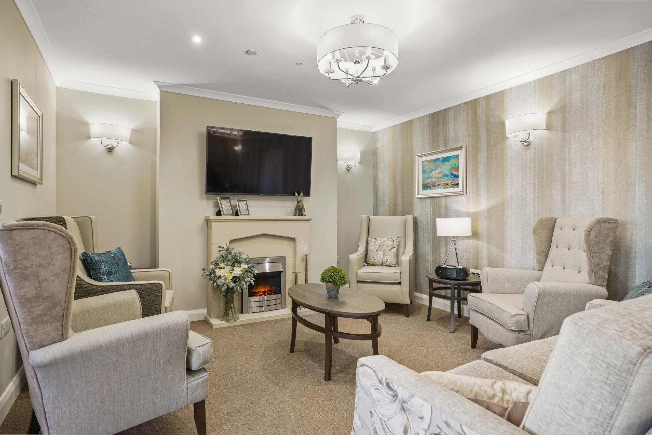 Cosy lounge with fireplace at Meadows Park