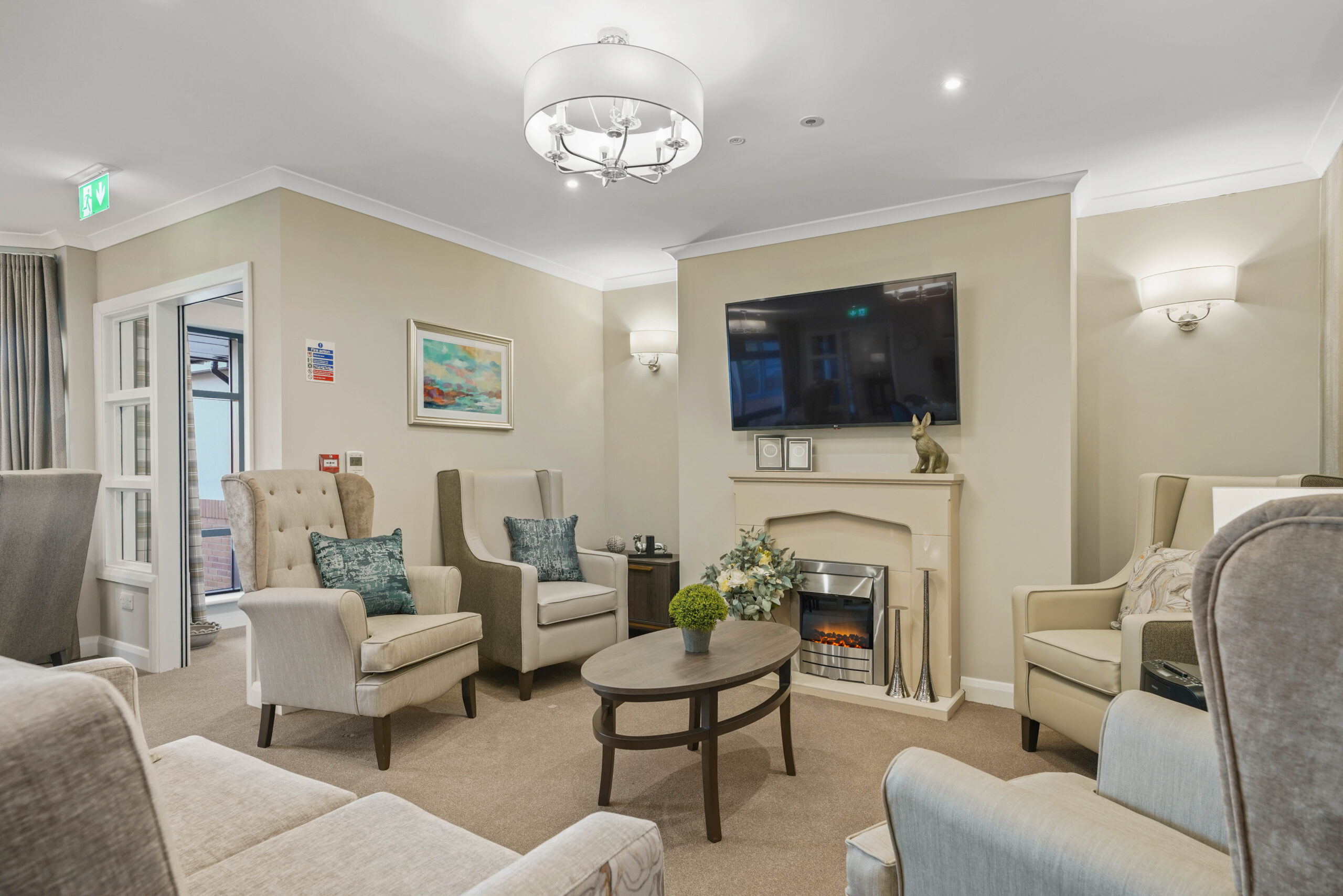 Lounge with fireplace at Meadows Park